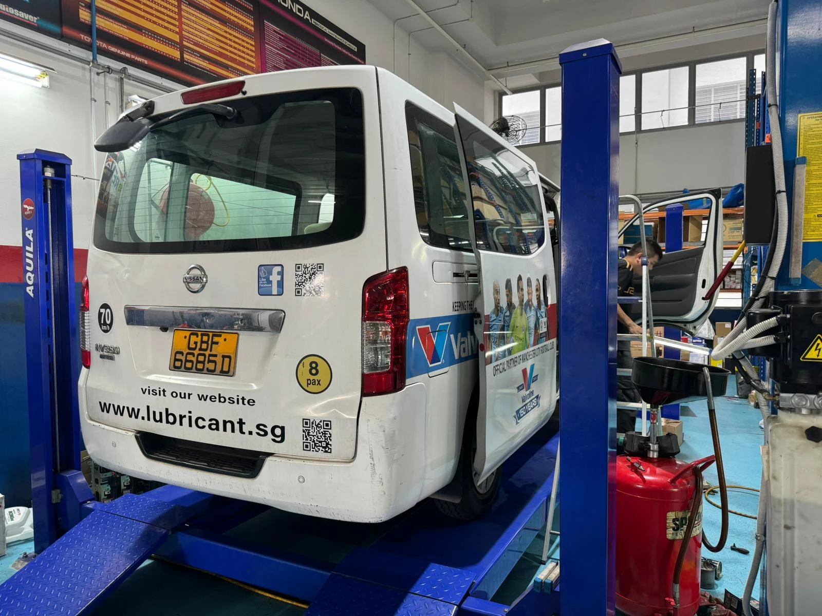 Vehicle on a service lift